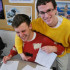 Jared Noftle and Ryan Lecours, '14, sharing a laugh on Ugly Sweater Day