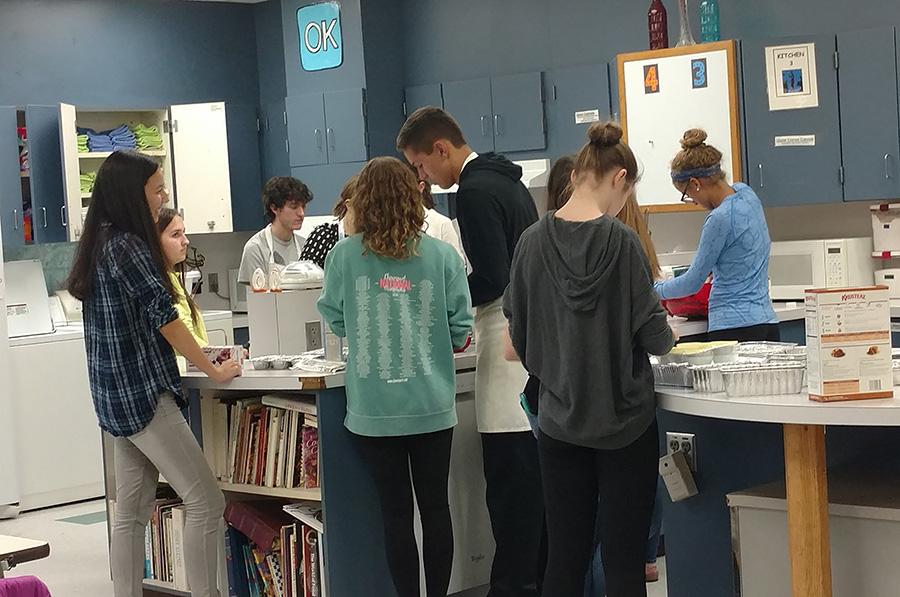 Adrianna Radlosalecv '17, Jack Byrne '17, Samantha Mello '17 and fellow Red Cross Club members prepare for one of their many fundraisers.