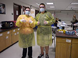 Kate McTigue and Zack Powers study lab safety at Nashua South