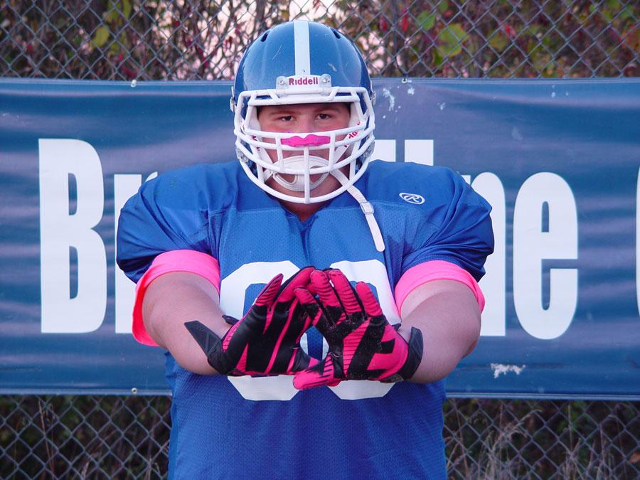 Football player Shea Farrell dons the pink to show his support 
Photo credit: Austin Bumpus