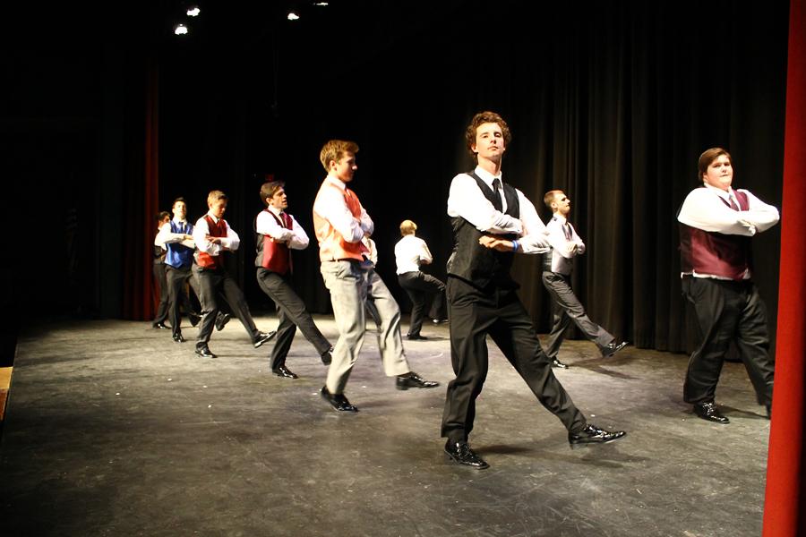 The men end the show with a repetition of their opening dance.