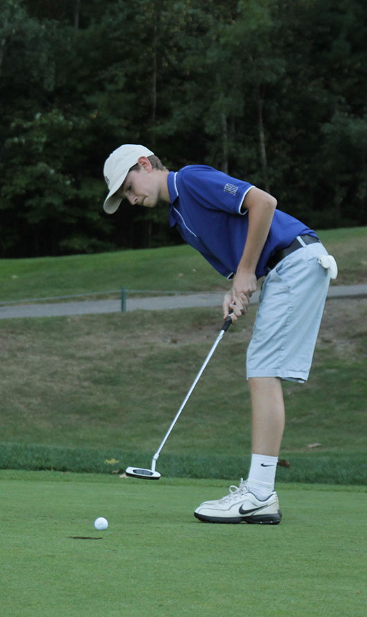 Instead of puttering around Friday, May 16, contact cavsgolf.com to support a great cause and get some time in on the green. Shown here, golf team captain Ryan Buckley 14 keeps his eye on the prize.