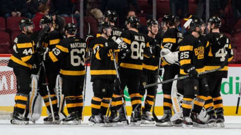 The Bruins congratulate one another following a 4-1 win in Montreal against the Habs.