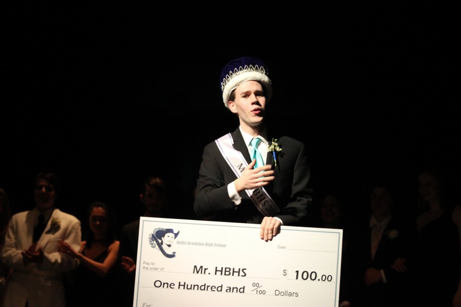 Bradley Simpson 16 accepting his winning check as Mr. HBHS 2016.
