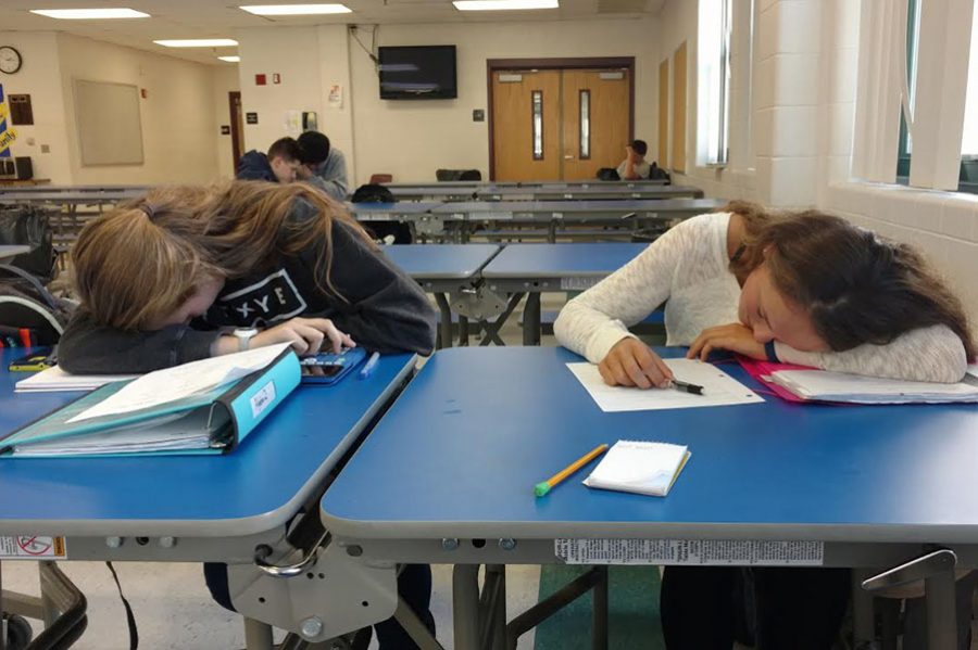 Johanna Golden (left) and Katie Souza (right) are tired after a long night of homework.