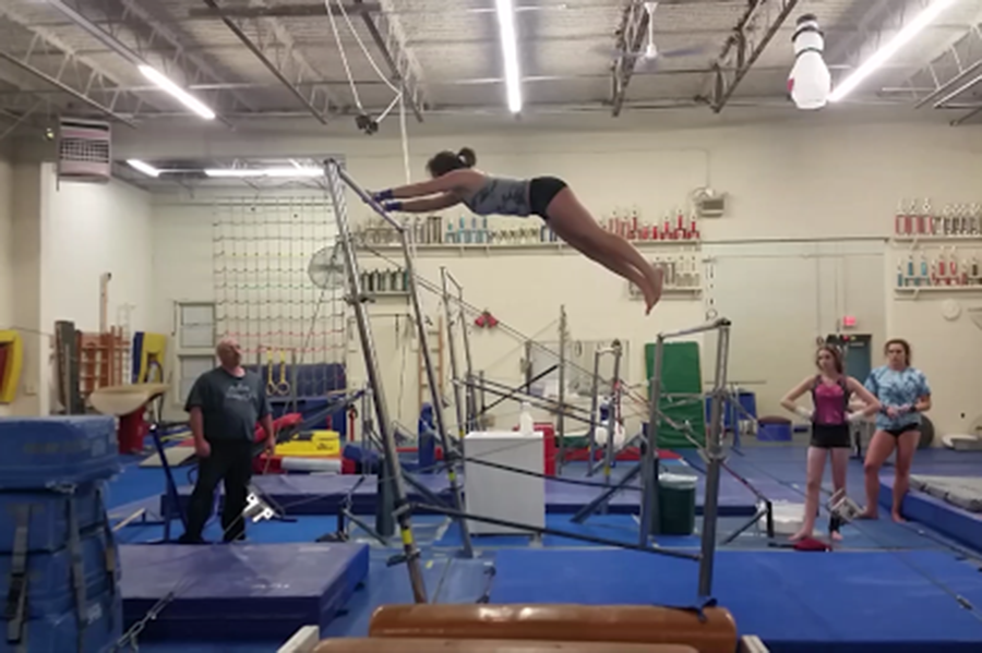 HBs+gymnastics+team+working+hard+at+practice.