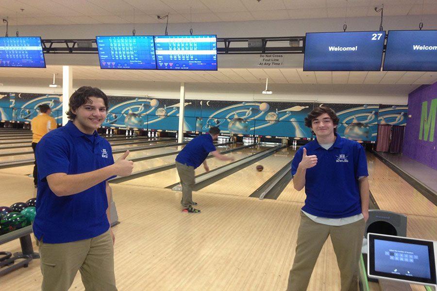Richard Cadario 17 and Scott Stone 17 standing by as Jake Collins 17 bowls a frame.