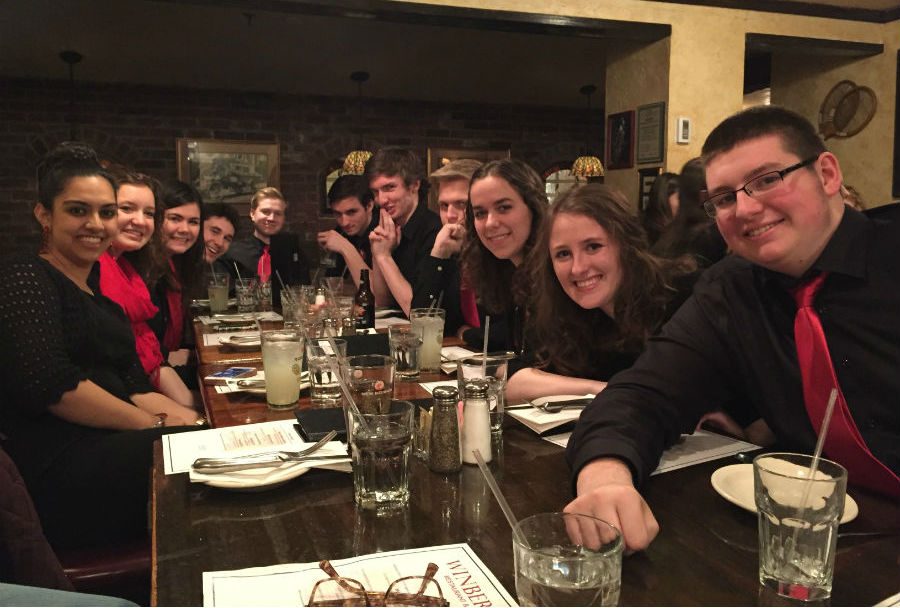 The Honors Choir eating dinner before a concert
