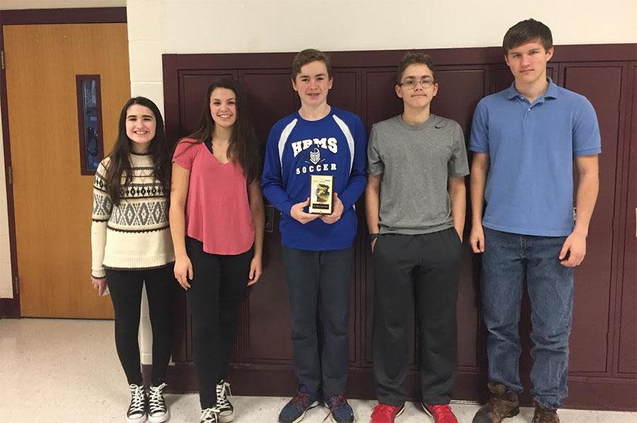 Freshmen Madison Kepnes, Jenna Connors, Aidan Chretian, Byron Dudley, and Bennett Decoteau prepare for their mock trial.