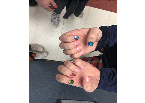 Sarah Fendt 19 showing off her newly painted nails.
