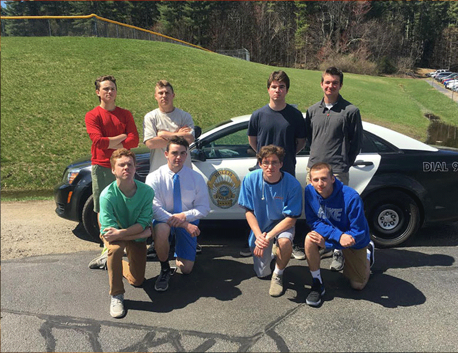 Left to right, top to bottom. Jack Macleod 17, Dan Leone 18, Evan Sutton 17, Jeremiah Jacob 17, Sam Hall 17, Colin Loftus 17, Kris Johnson 17, Nick Fothergill 17. The coaches (back row) and the winning team (front row) pose in front of a police car. 