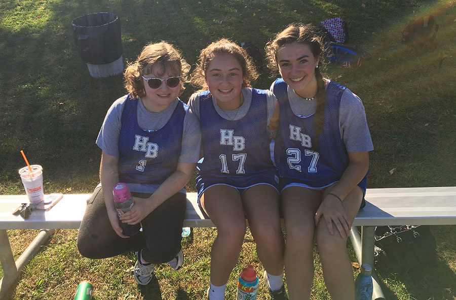 Watching the start of the game, three Unified players (Katelyn Heidel ‘19, Josie Farwell ‘20, Jessica Hubert ‘20) happily support their teammates. “I love cheering the team on,” said Josie. 

