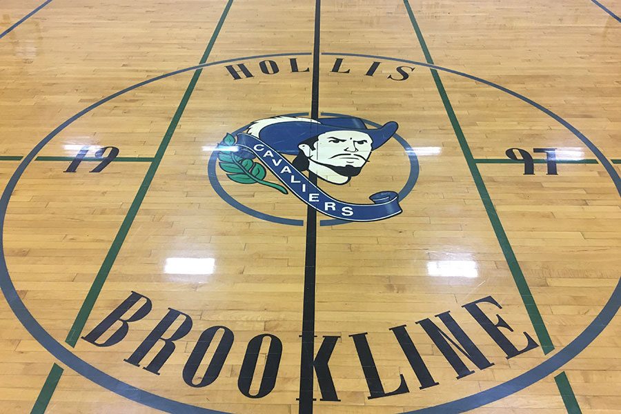 The center circle of the Hollis Brookline basketball court will be the starting point of many successful games this upcoming season.