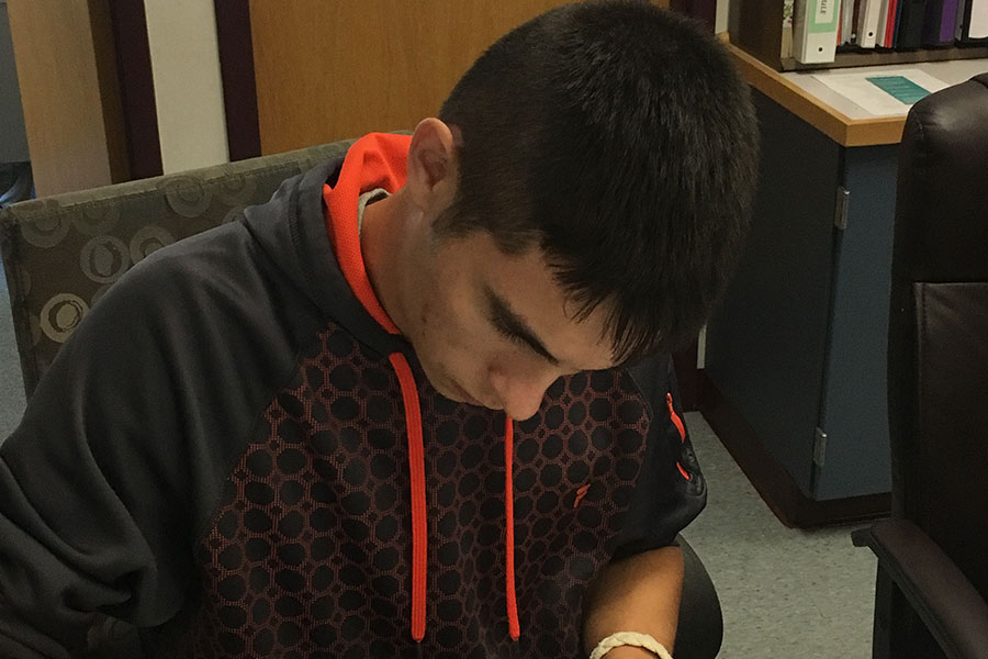 Senior Class Representative Jack Aldana-Proulx spends his fourth period in the library assisting Christine Heaton. He is a stand up individual and a wonderful spokesman for the senior class.