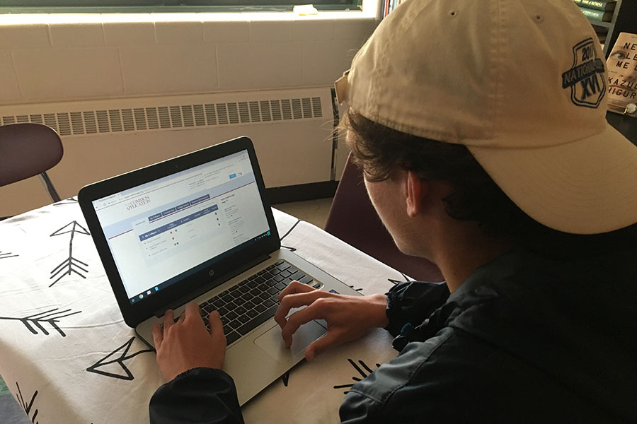 Jonathan Brackett ‘18 sits and finalizes his CommonApp as time winds down on the Early Action deadlines. “I think I’m in a good spot as far as the application goes,” said Brackett as he filled in his information.