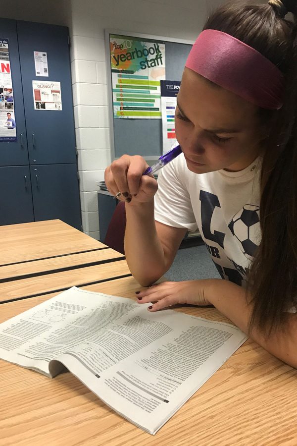 Thinking hard, Tasha White ‘20 sits quietly, going through the PSAT study guide. “I’m practicing for the practice in hopes I can earn a scholarship,” told White.