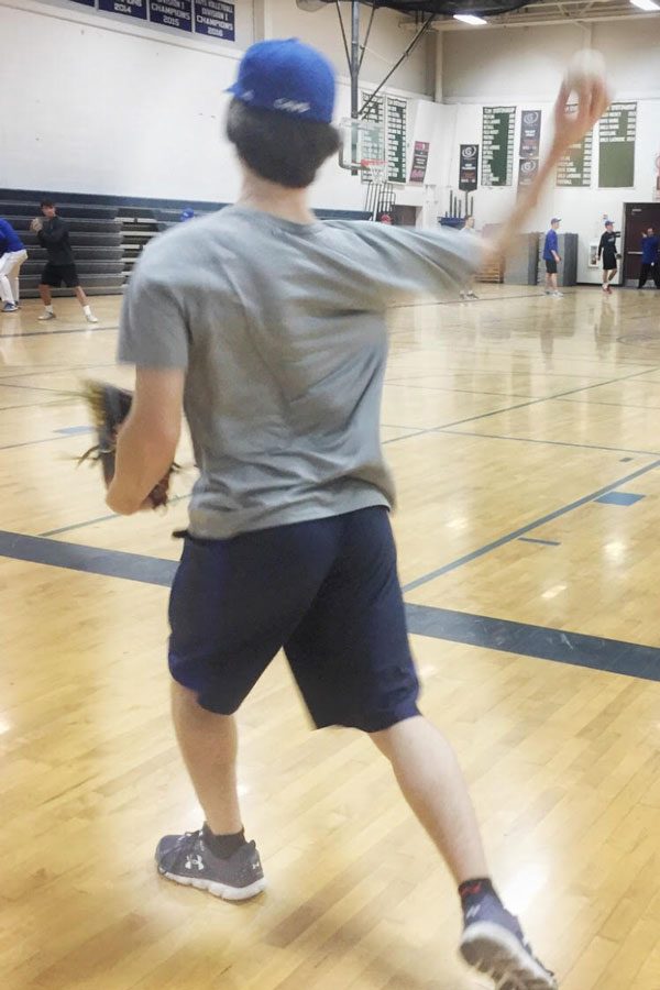 During tryouts, the boys baseball team prepares their base running skills in the gym, so that they can score ample runs this season. They paid close attention to coach Loftus as they would be called out if they didn’t watch closely. “We ring chasin’ this year. We’re winning the ship”, says HB’s Kaito Kramarczyk ‘19.
