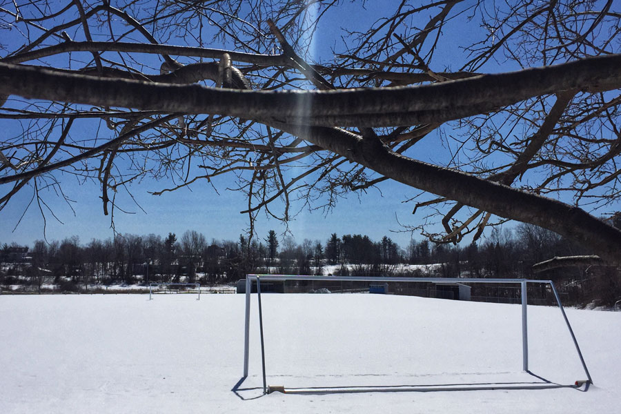 The HB soccer/baseball field lays covered in snow during the winter offseason. As soon as the snow melts, the field will once again be overused with the constant need of field space. “A turf field would be a huge help to the football team and HB sports in general”, said Brown ‘19.