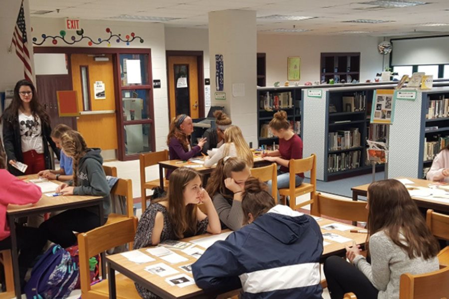 Students work in the library collaboratively in group projects. Heaton actively worked on creating a area for classes to come in, use resources, and create great work.  “This is an open-door classroom and an open-door learning space for anyone to use at any time,” said Heaton.