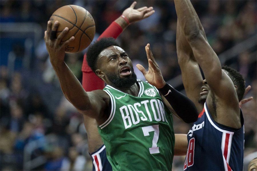 Jaylen Brown takes the ball to the rim through contact in a game against the Wizards. Despite battling injuries, Brown has been a key part of their success. “Jaylen now has two years under his belt and settling in, he has really elevated his level of play” says Michael Moscatelli ‘19.