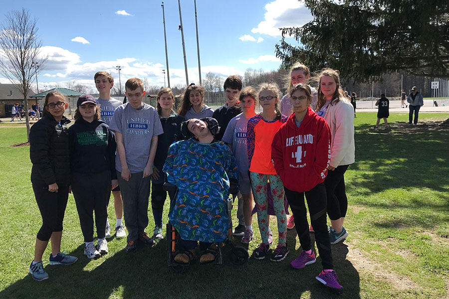 A couple of athletes and players pose together before their meet on May 1 at Concord High School. The team has been practicing for the past month in preparation for their first meet. “Everyone was excited for the meet, now we just have to practice to make perfect,” said Ashlyn Mansfield ‘19.