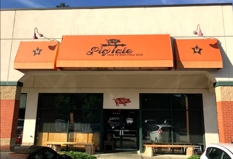  Pig Tale sits off of busy Amherst Street and adorns a bright orange sign. The restaurant is established in what was previously Crush Pizza Place. 
