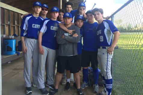 The boys baseball team poses as a close group after a successful 11-4 win over Milford on May 14 with determination in their eyes. The baseball team had a slow start to their season causing a desperately needed turn around in their play. “We're gonna make noise this season,” said Joe Brown ‘18 just before their last game on May 23.