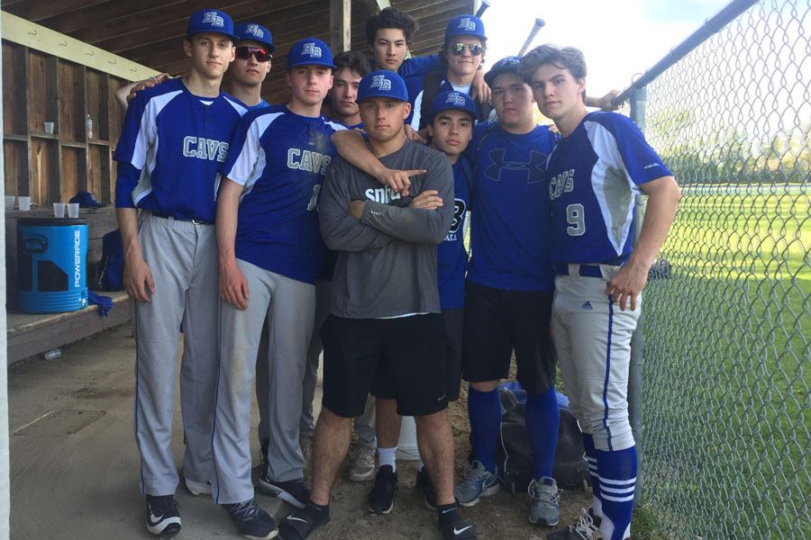 The boys baseball team poses as a close group after a successful 11-4 win over Milford on May 14 with determination in their eyes. The baseball team had a slow start to their season causing a desperately needed turn around in their play. “We're gonna make noise this season,” said Joe Brown ‘18 just before their last game on May 23.