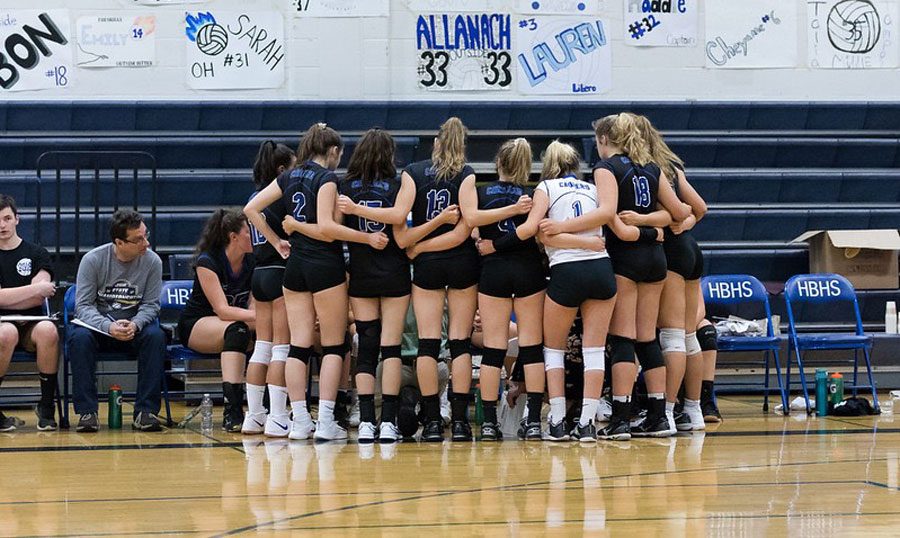 The+volleyball+team+prepares+for+their+home+game.+The+girls+won+their+game+against+Merrimack+and+improved+to+3-0.+%E2%80%9CIf+we+play+as+we+know+how+to%3B+I+think+we+can+win+%5Bthe+championship%5D+again%2C%E2%80%9D+said+Atkinson.