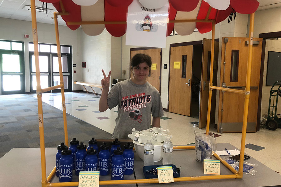 Jasmine Countermarsh ‘21 poses at the school store during Cav block on Thursday, June 7. The school store is part of the popcorn selling program set up by the Life Skills team. “The goal for the program is to integrate the students more into the regular population of the school in addition to teaching them money skills and skills one how to work in a pressure packed environment, it really kinds becomes one,” said Milton Robinson, a case manager.