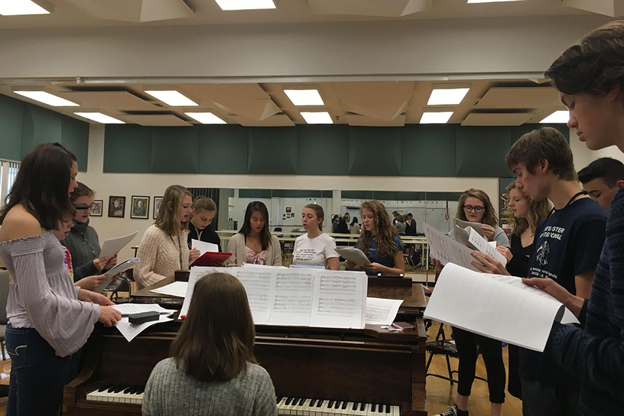 Fermata Nowhere members sing Dancing On My Own, by Calum Scott, arr. Robin, at their first rehearsal with the addition of newly auditioned members on September 21. Pictured from left to right is Nicole Plummer ‘19, Megan Mitchell ‘20, Emily Fox ‘22, Laurie Houvener ‘19, Katie Marsano ‘22, Lia Eisenberg ‘21, Erin Moynihan ‘19, Rachel Delong ‘22, Sam Price ‘20, Caroline Pack ‘19, Evan LaFrance ‘20, Daniel Delong ‘19 and William Scales ‘22, with Anna Musteata ‘22 as the rehearsal pianist. “I felt like we sounded really good and it’s nice to be with a group of people who know what they’re doing and they’re all really really good singers,” said Emily Fox ‘22.