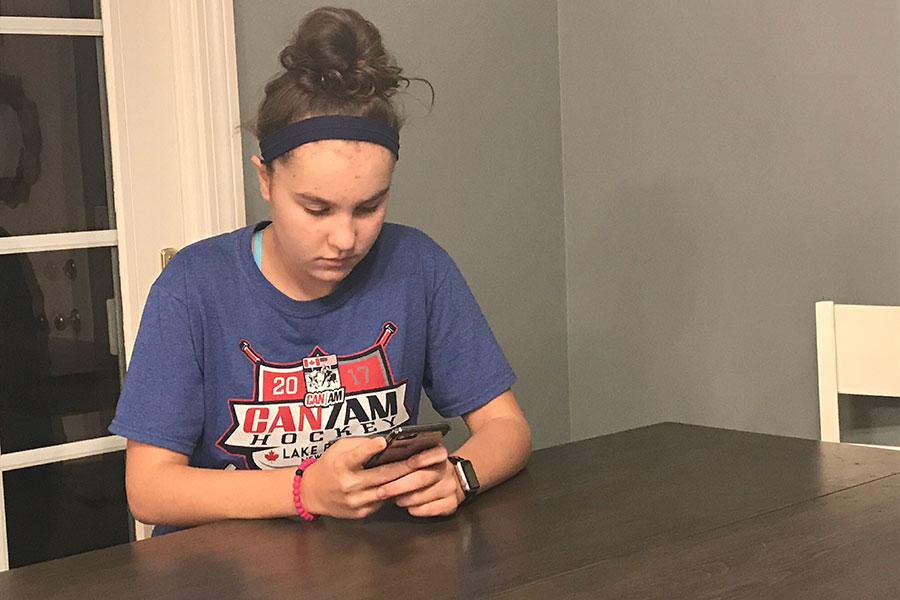 Kelsey Sova ‘22 is pictured here with her iPhone 8. The iPhone 8 was released last year as well as the iPhone X. Sova prefers the iPhone 8 because the iPhone XS is “very expensive.”