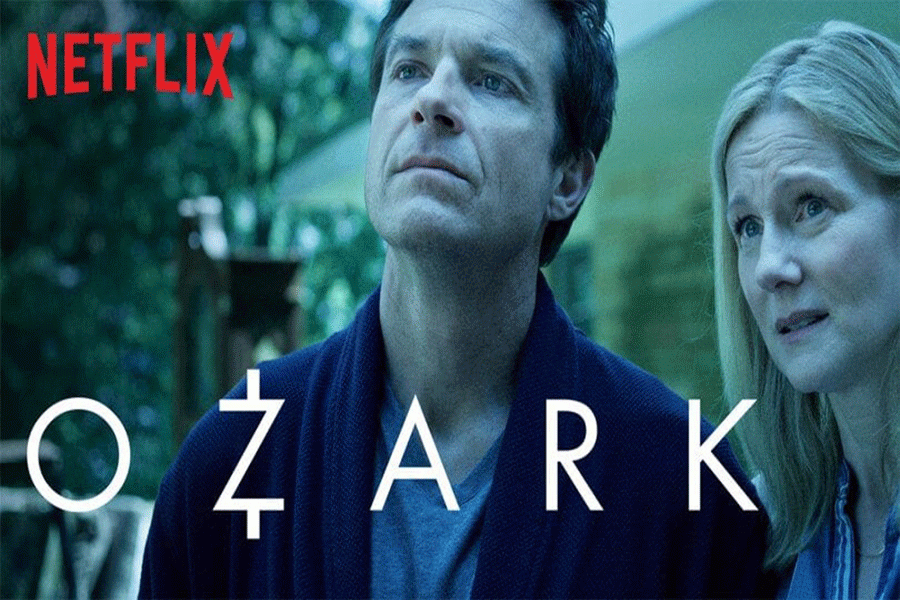 The official thumbnail for the Ozark series, featuring Marty Bryde and his wife Wendy, played by Jason Bateman and Laura Linney. The two are in front of their new home in the Ozark, Missouri.