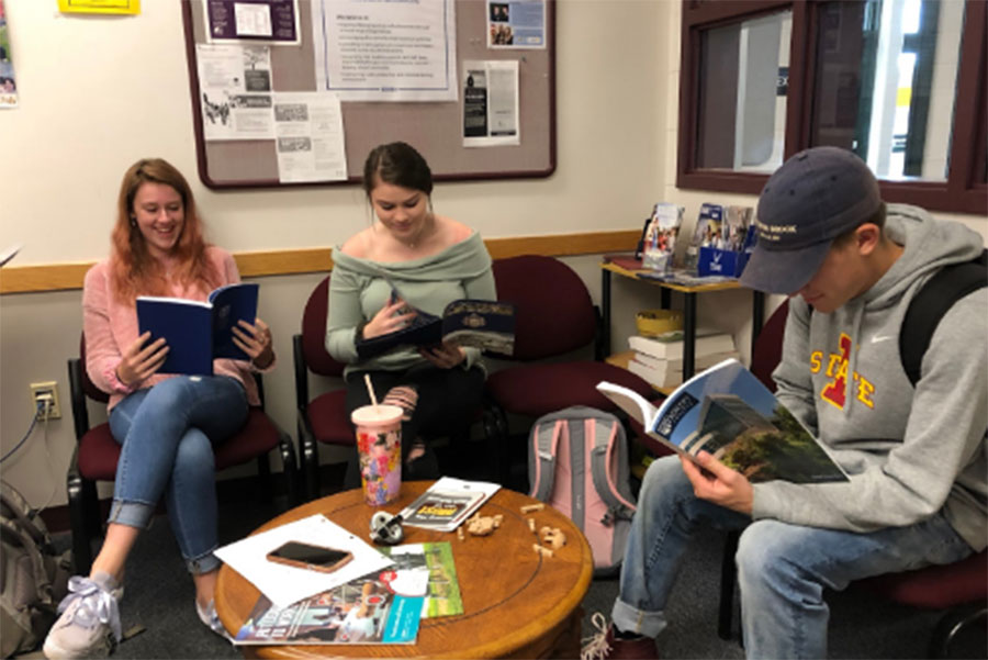 Current seniors, Elise Ferguson, Kylie Whiting and Lucien Boudreau (respectively), sit patiently in the school counseling office. Waiting to talk to their counselors about the many opportunities that are in front of them. Elise said it best, “Everything is so stressful, but taking it step by step helps a lot. It's not so overwhelming that way.”