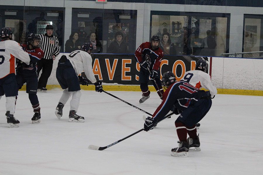 Pictured here is Dylan Terenzoni ‘19 scrambling away from Conval defenders. The HBDS Warriors have seen an improvement in their play this year compared to last, which is evident with their success. “My first three years on the team we had losing records, but this year we are currently 7-4 and tied for fourth place,” said Terenzoni.