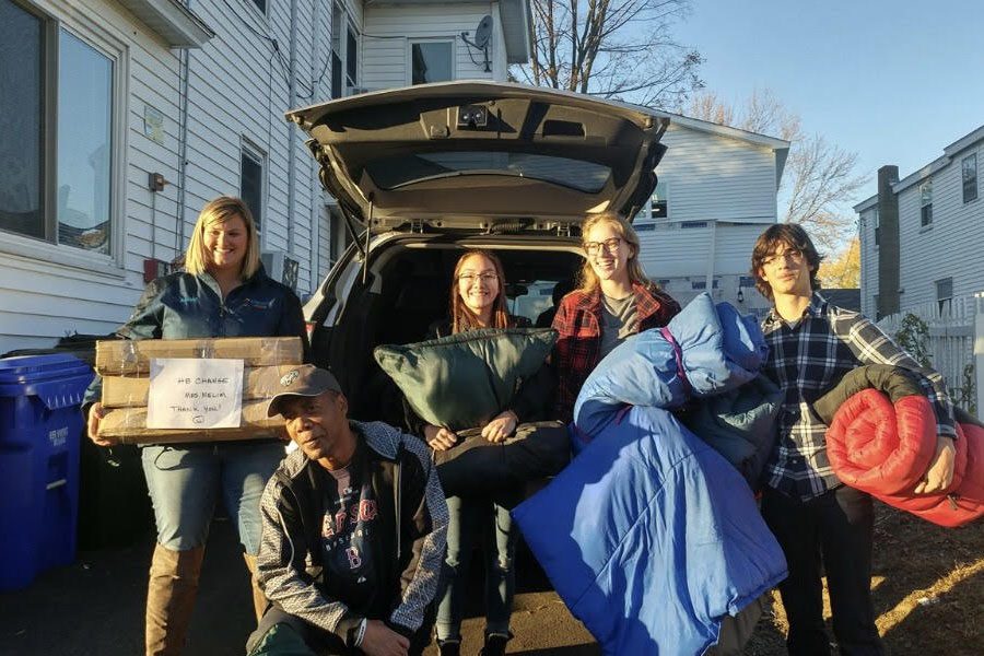 Pictured are a few members of HB the Change, Tess Crooks, Johanna Golden, and Lorenzo Occhialini, helping out in the community. HB is giving donations to the less fortunate in the homeless stage. “I think that all of us made an impact on at least one person’s lives,” said Maddie Norris ‘19. 