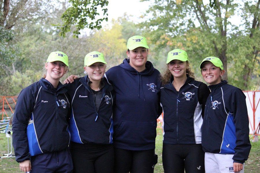  Pictured is 5 members of the Crew team at their Head of the Charles Regatta in the Fall. They participated in it on October 21, 2018. “It’s a long day  of racing, leading people around and cleaning up,” said Katie Souza’ 19.
