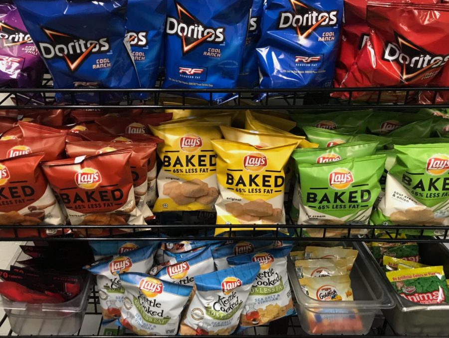 The+school+snack+line+is+the+perfect+place+to+see+the+abundance+of+unnecessary+packaging.+From+chips+to+beef+jerky%2C+everything+is+packaged+in+large.+Often+times%2C+this+packaging+can+be+excessively+large+for+the+sole+purpose+of+advertisement+space.+%E2%80%9CI+think+as+a+society%2C+we+are+used+buying+a+lot+of+packaged+goods+that+come+in+containers%2C+whether+thats+food+packaging+or+products+on+Amazon%2C%E2%80%9D+said+Carson.+