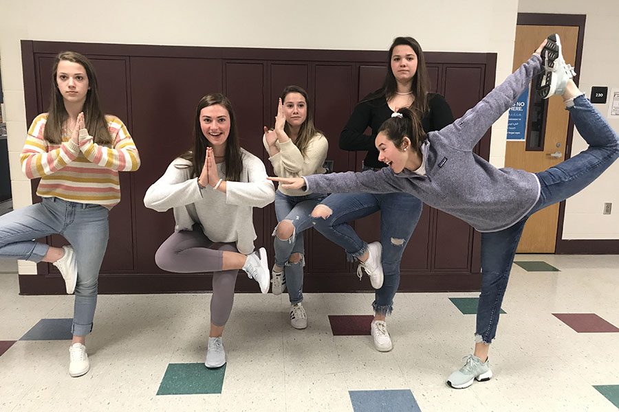  Peyton O’Connor, Jessica Hubert, Meredith Yardley, Tasha White, and Teresa DeMaio, all from the junior class, strike a pose in the halls. Yoga is an enjoyable activity to do with your friends. “Yoga is a way of life,” said O’Connor ‘20.
