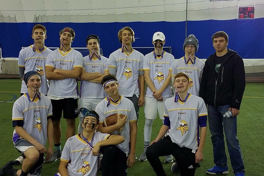 A Hollis Brookline flag football team celebrates their third consecutive championship in the Hampshire Dome Flag Football league. Hollis Brookline teams have consistently dominated this league since 2015, always winning their respective divisions. “Flag football is very big at Hollis Brookline, it almost feels like a dynasty,” said Brian Holroyd.