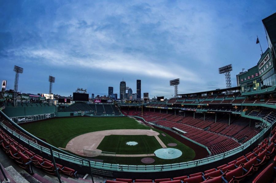 Caption: The sun rising at the empty Fenway Park, the morning of Apr. 2. It was supposed to be the Red Sox Home Opener, which has now been postponed indefinitely. “Despite no baseball, the Opening Day sunrise photo must live on,” said Billie Weiss, Red Sox photographer.