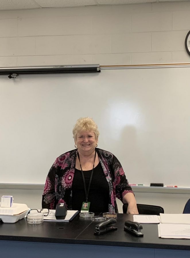 While getting materials ready for today’s AP Environmental Science class, Mrs. Brooks briefly removes her mask for a quick smiling photo. “Really the joy of my life is teaching science,” said Brooks.
