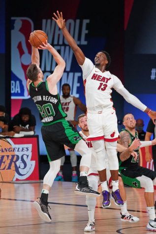 ORLANDO, FL - SEPTEMBER 25: Bam Adebayo #13 of the Miami Heat plays defense on Gordon Hayward #20 of the Boston Celtics during Game Five of the Eastern Conference Finals on September 25, 2020 in Orlando, Florida at AdventHealth Arena. NOTE TO USER: User expressly acknowledges and agrees that, by downloading and/or using this Photograph, user is consenting to the terms and conditions of the Getty Images License Agreement. Mandatory Copyright Notice: Copyright 2020 NBAE (Photo by Jesse D. Garrabrant/NBAE via Getty Images)