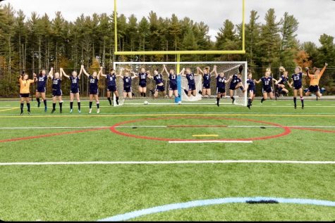 The girls soccer team jumps for a team photo on HB’s new turf field. Through COVID, team bonding time has been scarce, but the girls manage to take advantage of the time they have. “This has been especially hard because the better we are bonded as a team, the better we play together. However, as a team, we have made a huge effort to work with others during practices to solve this problem.” Said Abbie Ogren (‘22).