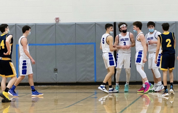 Pictured Left to Right, Matt Dias ‘21, Adam Razzaboni ‘21, Blake Bergerson ‘21, Kaleb Popham ‘23, and Robby Haytayan ‘21,  in their last regular season game against Conval. Brian Szewczyk, not pictured, was thrilled to play with teammates that had such a good bond, “ It’s going to be hard to leave these guys but I’m sure we will all keep in touch and have the same chemistry that we had during the season.”
