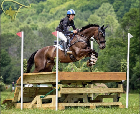 Audrey jumping Renan at one of their competitions.