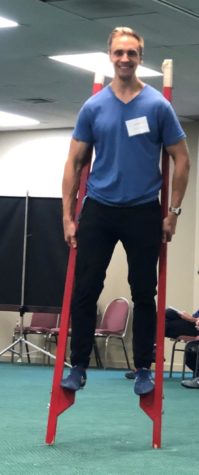 Buschman stands on a pair of stilts. Students and teachers alike can often find Buschmann participating in a fun activity like this, always with a smile on his face. “Mr. Buschamnn always makes sure our games are fair and that everyone is able to have fun and participate. He makes sure we all have fun” said Brianna Buckland, a HBHS sophomore. 