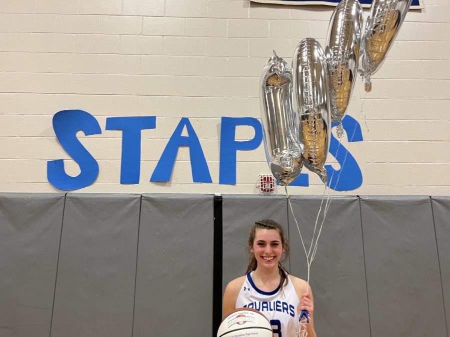 Elisabeth+Stapelfeld%E2%80%99+22+celebrates+her+1%2C000+point+accomplishment.+This+is+a+goal+she+has+been+working+towards+since+4+years+ago%2C+when+she+made+the+girls+varsity+basketball+team.+%E2%80%9CI+believed+in+myself+but+I+never+expected+it+to+happen.+I+knew+it+wasnt+going+to+be+handed+to+me%2C+I+had+to+work+for+it%2C%E2%80%9D+said+E.+Stapelfeld.