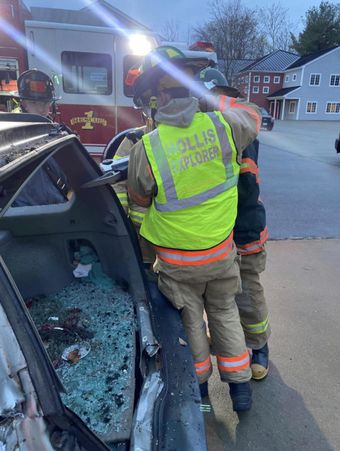 Explorers+got+the+chance+to+use+the+Hollis+Fire+Department%E2%80%99s+new+battery-powered+extrication+tools.+They+learned+how+to+extricate+a+patient+and+how+to+get+the+patient+out+of+the+vehicle%2C+trying+to+minimize+causing+more+injuries+to+the+patient.+%E2%80%9CThe+Explorer+program+is+a+representation+of+the+town+and+surrounding+areas.+We+encourage+the+kids+to+always+try+and+improve+themselves+each+day.+As+long+as+they+individually+improve%2C+then+our+mission+has+been+accomplished.+Positions+are+never+about+power+but+about+integrity.+We+honor+past+explorers+and+members+by+striving+to+pass+on+many+skills.+Staying+humble+is+important.+One+day+youre+up+and+the+next+maybe+not+so+much.+If+you+can+learn+from+what+has+happened%2C+then+you+can+adapt+and+apply+those+lessons.%E2%80%9D+said+Lieutenant+Tom+Lanzara+of+the+Hollis+Fire+Department.
