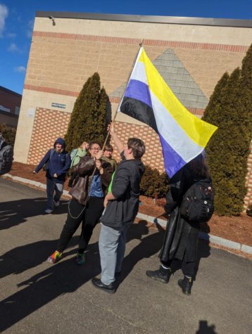 Students gather outside of Milford High School to protest the school board’s new bathroom policy. “It was nice seeing the school come together in such a respectful manner,” said MHS senior Jay Rowell.